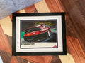 Framed Porsche Kills Bugs Fast poster recreation displayed against a textured wall